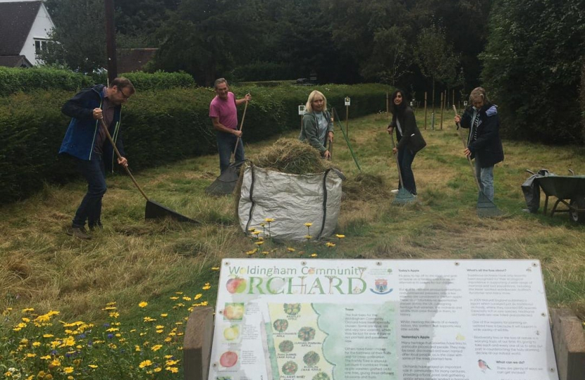 Claire with Anne Richardson and team in the orchard community garden 
