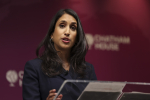 Claire Coutinho delivering a speech at Chatham House